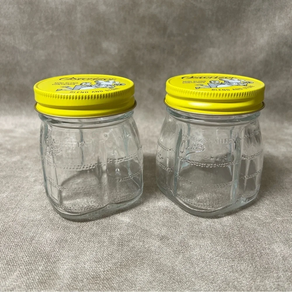 Set of (2) Osterizer Blend and Store Mini-Blend Containers Jars 8 oz
